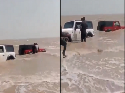 Viral Video perform stunt in sea Thar got stuck in waves Instagram reel obsession | Viral Video: समुद्र में स्टंट करने पहुंचे थे, रील के चक्कर में लहरों में फंसी थार, किसी तरह बची जान, देखें वीडियो