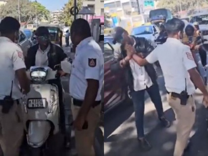 Bengaluru It was difficult for police stop person without helmet the angry person cut finger police constable | VIDEO: बिना हेल्मेट के व्यक्ति को रोकना पुलिस को पड़ा भारी, गुस्साए व्यक्ति ने पुलिस कांस्टेबल की उंगली काट ली