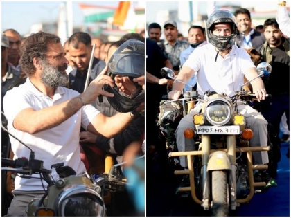 During mp congress Bharat Jodo Yatra Rahul Gandhi run bullet bike wearing helmet guest passengers video | देखें वीडियो: भारत जोड़ो यात्रा के दौरान राहुल गांधी ने चलाई बुलेट, हेलमेट लगाकर मेहमान यात्रियों को कराई बाइक की सवारी