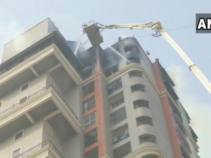 Navi Mumbai: Fire breaks out at high-rise apartment building at Sector 44 Nerul Seawoods; Fire tenders present at the spot. #Maharashtra | नवी मुंबई के सेक्टर 44 में एक बहुमंजिला इमारत में लगी आग, दमकल की गाड़ियां मौके पर मौजूद Navi Mumbai: Fire breaks out at high-rise apartment building at Sector 44 Nerul Seawoods; Fire tenders present at the spot. #Maharashtra | नवी मुंबई के सेक्टर 44 में एक बहुमंजिला इमारत में लगी आग, दमकल की गाड़ियां मौके पर मौजूद