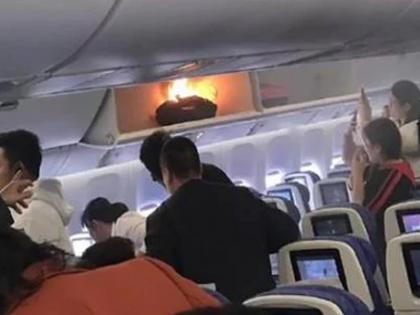 A fire broke out in the luggage rack of a China Southern airplane in Guangzhou | VIDEO: अचानक फ्लाइट में लगी आग, एयर होस्टेस ने समझदारी से ऐसे पाया काबू A fire broke out in the luggage rack of a China Southern airplane in Guangzhou | VIDEO: अचानक फ्लाइट में लगी आग, एयर होस्टेस ने समझदारी से ऐसे पाया काबू