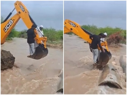 VIDEO heavy rains people crossing raging river in Gujarat with help of JCB | VIDEO: भारी बारिश से जोखिम में जान, गुजरात में उफनती नदी को जेसीबी की मदद से पार करते लोगों का वीडियो हुआ वायरल, देखें
