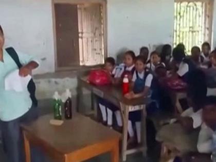 ON CAMERA Gunman 'hijacks' state-run school in West Bengal, enters classroom with knife & acid to create panic see video | मालदाः बंदूकधारी ने सरकारी स्कूल को 'बंधक' बनाया, दहशत पैदा करने के लिए चाकू और एसिड के साथ घुसा, देखें वीडियो