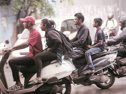 Gujarat government makes helmet optional in cities | गुजरात सरकार ने शहरों में हेलमेट पहनना वैकल्पिक बनाया