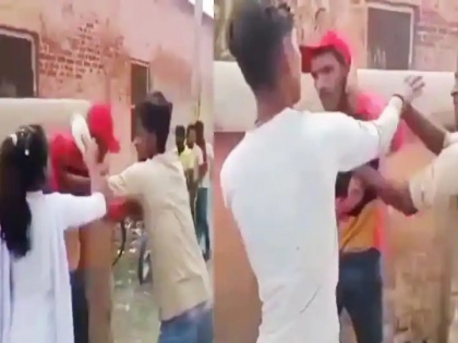 chhapra boy beaten by slippers while asking for girl mobile number local attack harasser in bihar janta bazar viral videos | लड़की से मोबाइल नंबर मांगने पर लड़के को मिली चप्पलों से मार, बीच बाजार में ऐसी हुए मंचले की कुटाई, देखें वीडियो