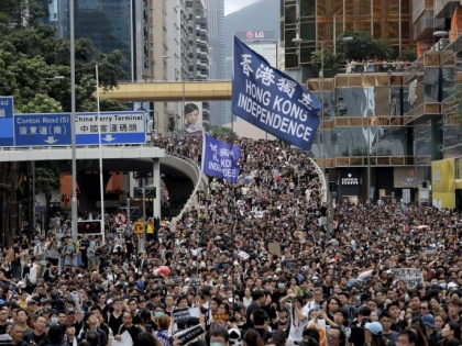 Hong Kong protesters pin hopes on the ballot box after weeks of violence | हांगकांग में जिला परिषद चुनावों के लिए हो रहा है मतदान