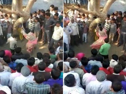 husband brutally thrash his wife due to illicit relationship in uttar pradesh | UP: पंचायत के तुगलकी फरमान पर युवक ने पत्नी को पेड़ से बांध ऐसे की पिटाई, भीड़ बनी रही तामशमीन 