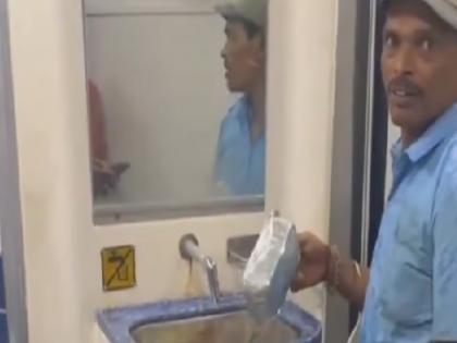 A man was caught cleaning disposable food containers for reuse on a train | VIDEO: ट्रेन में एक व्यक्ति डिस्पोजेबल फूड कंटेनर्स को दोबारा इस्तेमाल के लिए साफ करता हुआ पकड़ा गया, भारतीय ट्रेनों में स्वच्छता मानकों पर उठे गंभीर सवाल