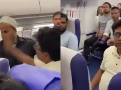 IndiGo passenger slaps co-traveller aboard Mumbai-Kolkata flight video surfaces online see police watch | इंडिगो विमान में यात्री ने दूसरे यात्री को थप्पड़ मारा, आरोपी को सुरक्षा दल को सौंपा, देखिए वीडियो