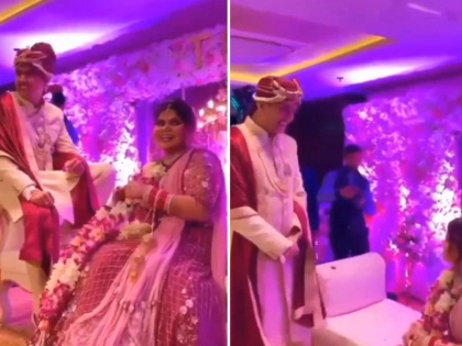 People liked the game of bride and groom's garland, the video went viral | लोगों को पसंद आया दूल्हा-दुल्हन के वरमाला का खेल, जमकर वायरल हो रहा है वीडियो