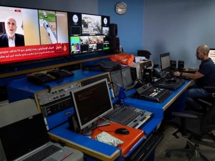 Israel raids Al Jazeera office in West Bank, shuts it down Take all the cameras and leave West Bank bureau chief Walid al-Omari | Israel raids Al Jazeera office in West Bank: अल जजीरा कार्यालय पर छापा?, इजराइली सैनिकों कार्यालय आए और लाइव प्रसारण को बंद किया, कर्मचारियों तुरंत चले जाने को कहा... Israel raids Al Jazeera office in West Bank, shuts it down Take all the cameras and leave West Bank bureau chief Walid al-Omari | Israel raids Al Jazeera office in West Bank: अल जजीरा कार्यालय पर छापा?, इजराइली सैनिकों कार्यालय आए और लाइव प्रसारण को बंद किया, कर्मचारियों तुरंत चले जाने को कहा...