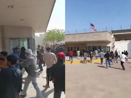 Mob storms US Consulate in Pakistan after Khamenei's death; 9 killed in violent clash | VIDEO: खामेनेई की मौत के बाद पाकिस्तान में US कॉन्सुलेट पर भीड़ ने बोला धावा, 9 लोगों की मौत Mob storms US Consulate in Pakistan after Khamenei's death; 9 killed in violent clash | VIDEO: खामेनेई की मौत के बाद पाकिस्तान में US कॉन्सुलेट पर भीड़ ने बोला धावा, 9 लोगों की मौत