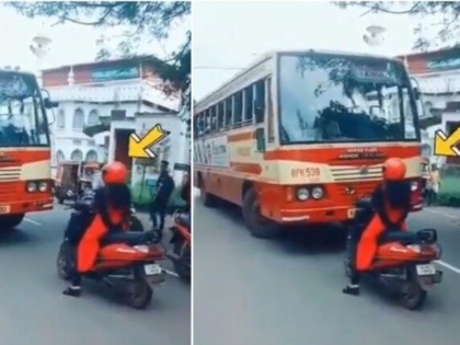 Kerala woman on scooty makes bus driver take right lane Internet explodes in praise | वीडियो: महिला ने लबे रोड सरकारी बस के सामने अड़ा दिया अपना स्कूटर, ड्राइवर से पालन कराया ट्रैफिक रूल