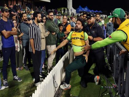 PAK vs NZ, 3rd ODI: Khushdil Shah Violently Confronts Pakistani Fans Taunting Team Over Clean Sweep, Shocking Visuals Surface | PAK vs NZ, 3rd ODI: न्यूजीलैंड के खिलाफ क्लीन स्वीप के बाद पाकिस्तानी प्रशंसकों ने उड़ाया मजाक, तो उन्हें मारने दौड़े खुशदिल शाह, देखें चौंकाने वाले दृश्य