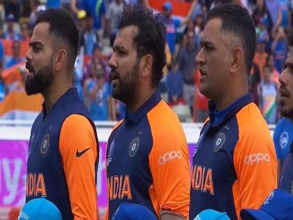इंग्लैंड के खिलाफ मैच से पहले राष्ट्रगान के दौरान कोहली, रोहित और धोनी