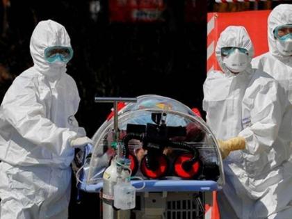 COVID-19: ब्रिटेन में दोगुनी रफ्तार से फैल रहा है कोरोना वायरस का 'नया प्रकार', जानिये WHO ने क्या कहा