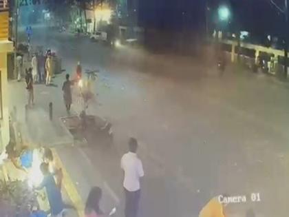 A person bursting crackers on the road in Pune died after being hit by a car, the incident was captured on CCTV | WATCH: पुणे में सड़क पर पटाखे फोड़ रहे एक व्यक्ति की कार की चपेट में आने से मौत, CCTV में कैद घटना