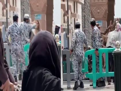 VIDEO: A burqa-clad woman slapped a security officer at Masjid An-Nabawi in Medina, Saudi Arabia; the officer also slapped her in response | VIDEO: सऊदी अरब के मदीना में मस्जिद अन-नबावी में बुर्का पहनी महिला ने सिक्योरिटी ऑफिसर को मारा थप्पड़, जवाब में अधिकारी ने भी जड़ा