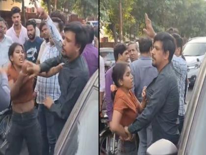 High-Voltage Drama Caught On Camera: Wife Thrashes Husband On Road Over Court Case In UP's Meerut - VIDEO | कैमरे में कैद हुआ हाई-वोल्टेज ड्रामा: यूपी के मेरठ में पत्नी ने सड़क पर पति को धूंचा | VIDEO