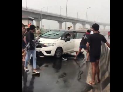 Viral Video Kanwariyas attacked car in Meerut Car rider beaten badly | Viral Video: मेरठ में कांवड़ियों ने कार पर किया हमला, गाड़ी पर बरसाए डंडे; कार सवार को जमकर पीटा Viral Video Kanwariyas attacked car in Meerut Car rider beaten badly | Viral Video: मेरठ में कांवड़ियों ने कार पर किया हमला, गाड़ी पर बरसाए डंडे; कार सवार को जमकर पीटा