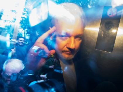 Julian Assange, appeared in a British court on Thursday for an initial hearing on whether he will be extradited to the United States to face prosecution in connection with one of the most serious leaks of classified material in American history. | विकीलीक्स संस्थापक जूलियन असांज ने अमेरिका में प्रत्यर्पण के खिलाफ कानूनी लड़ाई शुरू की, अगली सुनवाई 30 मई को