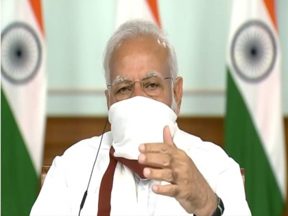 Corona: PM Modi holds meeting with chief ministers wearing homemade mask | पीएम मोदी ने अपनी बात पर किया अमल, गमछे का मास्क पहनकर मुख्यमंत्रियों संग की बैठक, तस्वीरें वायरल