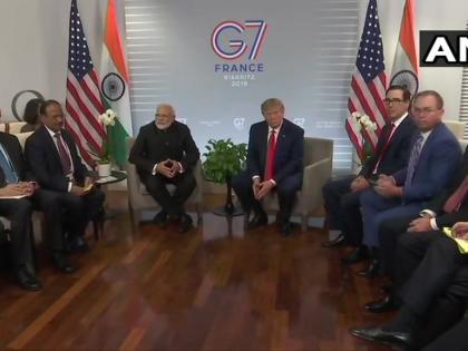 France PM Narendra Modi holds bilateral meeting with US President Donald Trump G7Summit in Biarritz | G-7 सम्मेलन में डोनाल्ड ट्रंप से मिले पीएम मोदी, भारत और पाकिस्तान के बीच कई द्विपक्षीय मुद्दे हैं और हम किसी तीसरे देश को कष्ट नहीं देना चाहते France PM Narendra Modi holds bilateral meeting with US President Donald Trump G7Summit in Biarritz | G-7 सम्मेलन में डोनाल्ड ट्रंप से मिले पीएम मोदी, भारत और पाकिस्तान के बीच कई द्विपक्षीय मुद्दे हैं और हम किसी तीसरे देश को कष्ट नहीं देना चाहते