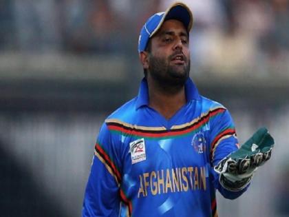mohammad shahzad banned for one odi by Afghanistan Cricket Board for breaching code of conduct | अफगानिस्तान के इस खिलाड़ी पर लगा एक वनडे का बैन, मैच के बाद की थी अंपायर की आलोचना