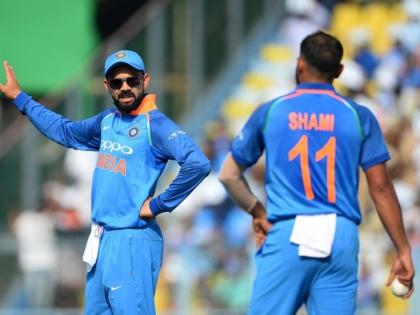 India vs West Indies: Fans troll bcci for dropping Mohammed Shami Instead Of Umesh Yadav | Ind vs WI: शमी को टीम से बाहर करने पर फैंस ने किया BCCI को ट्रोल, पूछा, 'उमेश टीम में क्यों हैं?'