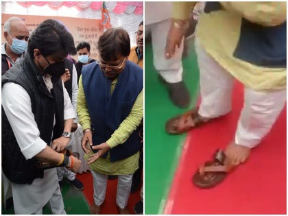 mp Energy Minister Pradhuman Singh Tomar wore slippers after 66 days Jyotiraditya Scindia bjp video | वीडियो: पूरे 66 दिन बाद मध्य प्रदेश के ऊर्जा मंत्री प्रद्युम्न सिंह तोमर ने पहना चप्पल, ज्योतिरादित्य सिंधिया उन्हें खुद पहनाने के लिए मौके पर थे मौजूद