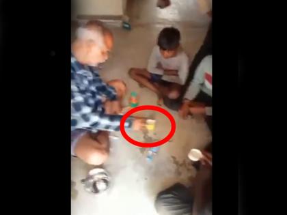 watch MP teacher is teaching how to make pegs Offering Alcohol To Students In Viral Video | MP: शिक्षा के मंदिर का ये कैसा रूप! पढ़ाई-लिखाई सिखाने के बजाय 'पैग' बनाना सिखा रहा शिक्षक, VIDEO वायरल होते ही मचा हड़कंप watch MP teacher is teaching how to make pegs Offering Alcohol To Students In Viral Video | MP: शिक्षा के मंदिर का ये कैसा रूप! पढ़ाई-लिखाई सिखाने के बजाय 'पैग' बनाना सिखा रहा शिक्षक, VIDEO वायरल होते ही मचा हड़कंप
