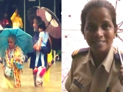 A Mumbai Policewoman helps wade through a waterlogged street in Mumbai's Hindmata | #KuchhPositiveKarteHain: मुंबई - इस महिला पुलिसकर्मी के लिए जान से बढ़कर है ड्यूटी, बारिश में ऐसे कर रही लोगों की मदद, वीडियो वायरल