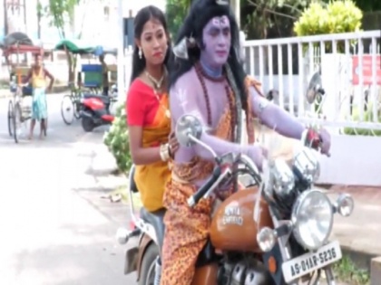 Assam man arrested for dressing up as Lord Shiva, riding bike in street play on price hike | असम: भगवान शिव के भेष में महंगाई पर नुक्कड़ नाटक को लेकर विवाद, पुलिस ने एक्टर को किया गिरफ्तार