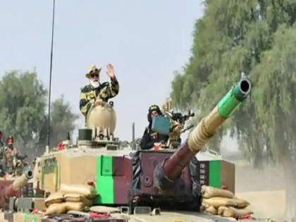 PM Narendra Modi rides on Arjun’s tank at Longewala Post on western border near Pakistan, watch video | लोंगेवाला में पाकिस्तान से लगे सीमा पर पीएम नरेंद्र मोदी हुए टैंक पर सवार, चीन और पाकिस्तान को दी चेतावनी, देखें वीडियो