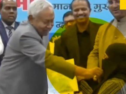 Bihar Chief Minister Nitish Kumar video emerged seen pulling down hijab Muslim woman government function | महिला डॉक्टर का हिजाब हाथों से खींचकर हटाने से विवादों में घिरे मुख्यमंत्री नीतीश कुमार, विपक्ष हमलावर Bihar Chief Minister Nitish Kumar video emerged seen pulling down hijab Muslim woman government function | महिला डॉक्टर का हिजाब हाथों से खींचकर हटाने से विवादों में घिरे मुख्यमंत्री नीतीश कुमार, विपक्ष हमलावर