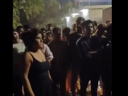 woman in Greater Noida publicly dragged man by the collar passersby remained spectators video viral | VIDEO: ग्रेटर नोएडा में महिला की दंबगई, सरेआम शख्स का कॉलर पकड़ घसीटा; राहगीरों बने रहे तमाशबीन