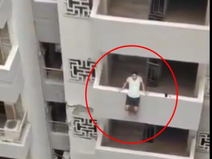 Viral Video Man tries to jump from 12th floor in Noida Uttar Pradesh neighbours interrupt suicide attempt | VIRAL VIDEO: 12वीं मंजिल से छलांग लगाने जा रहा था शख्स, तभी हुआ कुछ ऐसा...; वीडियो देख दंग रह जाएंगे आप