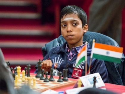 FTX Crypto Cup: chess player Praggnanandhaa stuns five time World Champion Carlsen | FTX Crypto Cup: भारत के 17 साल के ग्रैंडमास्टर प्रज्ञानन्द ने विश्व नंबर एक मैगनस कार्लसन को दी मात, पर खिताब से चूके