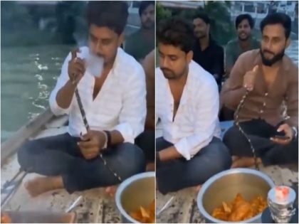 prayagraj Video chicken hookah party in river Ganga went viral celebration celebrated by riding a boat up police investigate | Video: गंगा में चिकन और हुक्का पार्टी का वीडियो हुआ वायरल, बीच नदी में नाव पर सवार होकर मनाया गया जश्न