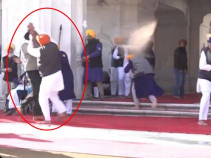 Sukhbir Singh Badal Attacked Man Opens Fire at Akali Dal Leader at Entrance of Golden Temple in Amritsar Taken Into Custody | Sukhbir Singh Badal Attacked: स्वर्ण मंदिर के एंट्री गेट पर अकाली दल नेता पर चली गोलियां, शख्स ने सरेआम किया हमला Sukhbir Singh Badal Attacked Man Opens Fire at Akali Dal Leader at Entrance of Golden Temple in Amritsar Taken Into Custody | Sukhbir Singh Badal Attacked: स्वर्ण मंदिर के एंट्री गेट पर अकाली दल नेता पर चली गोलियां, शख्स ने सरेआम किया हमला
