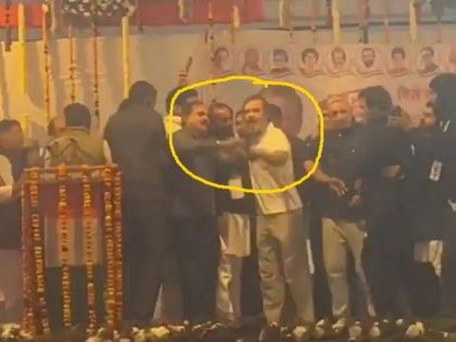 Rahul Gandhi jerked supporter taking a selfie by climbing on bharat jodo yatra stage clip went viral | वीडियो: मंच पर चढ़ कर सेल्फी ले रहे समर्थक का राहुल गांधी ने हाथ पकड़कर झटका, फोटो लेने से कांग्रेस नेता ने रोका, क्लिप हुआ वायरल