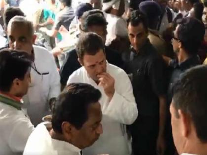 #CongressSankalpYatra: Rahul Gandhi Bhopal winking roadshow tea break, Video | वीडियो: चाय-समोसा-सेल्फी के साथ राहुल गांधी ने मध्य प्रदेश में फूंका चुनावी बिगुल #CongressSankalpYatra: Rahul Gandhi Bhopal winking roadshow tea break, Video | वीडियो: चाय-समोसा-सेल्फी के साथ राहुल गांधी ने मध्य प्रदेश में फूंका चुनावी बिगुल