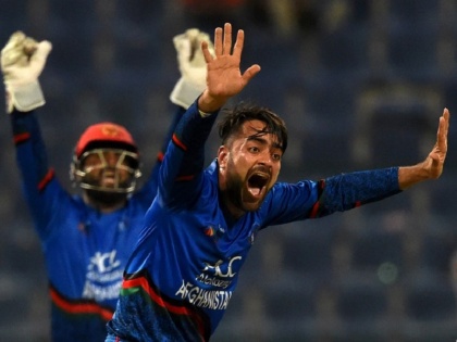 icc odi ranking rashid khan becomes top ranked all rounder after asia cup 2018 | आईसीसी वनडे रैंकिंग: राशिद बने 'टॉप' पर पहुंचने वाले पहले अफगान खिलाड़ी, बल्लेबाजों में रोहित-धवन ने लगाई छलांग