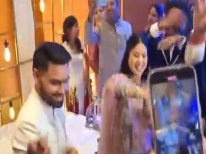 Cricketer Rinku Singh Dances Awkwardly To 'Gallan Goodiyan' Song During Celebrations After Engagement With MP Priya Saroj | Video: सगाई के बाद जश्न के दौरान 'गल्लां गूड़ियां' गाने पर डांस करने में झिझके क्रिकेटर रिंकू सिंह, पर जोश में झूमी मंगेतर प्रिया सरोज