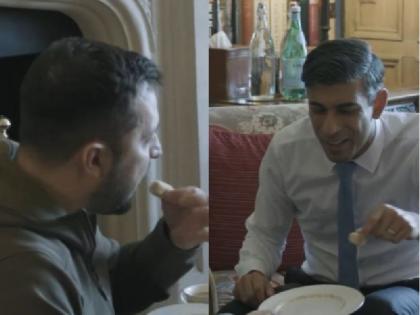 Rishi Sunak feeds mother barfi to Volodymyr Zelensky who arrived in Britain video viral | ब्रिटेन पहुंचे वोलोदिमीर जेलेंस्की को ऋषि सुनक ने खिलाई मां के हाथ की बर्फी, वीडियो वायरल