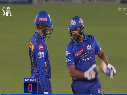 RR vs MI: Rohit Sharma's DRS timing creates storm on the internet, fans get angry | WATCH | RR vs MI: रोहित शर्मा की DRS टाइमिंग ने इंटरनेट पर खड़ा किया तूफान, प्रशंसक भड़के | WATCH
