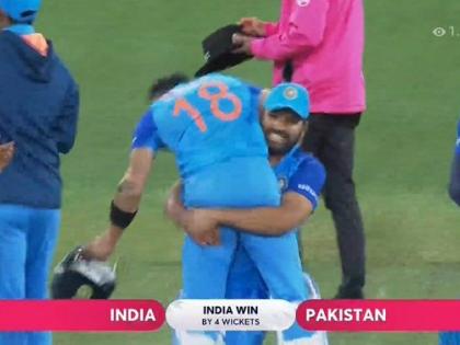 virat kohli-rohit sharma ind vs pak ICC T20 World Cup 2022 victory against pakistan his shoulder walking hardik pandya see video | पाकिस्तान पर जीत के बाद कप्तान रोहित ने विराट को कंधे पर उठाया, देखें वीडियो