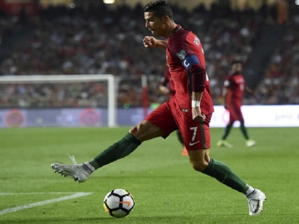fifa world cup cristiano ronaldo son stunning goal after portugal vs algeria friendly match | रोनाल्डो के 7 साल के बेटे ने हजारों फैंस की भीड़ के बीच दागा दमदार गोल, देखिए वीडियो