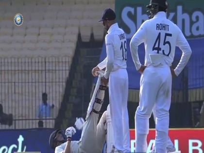 India vs England Virat Kohli rushed to Joe Root aid during Chennai Test viral video | मैदान पर दर्द से कराहते हुए जमीन पर गिरे जो रूट तो मदद करने पहुंचे विराट कोहली, फैंस का दिल जीत रहा यह वीडियो