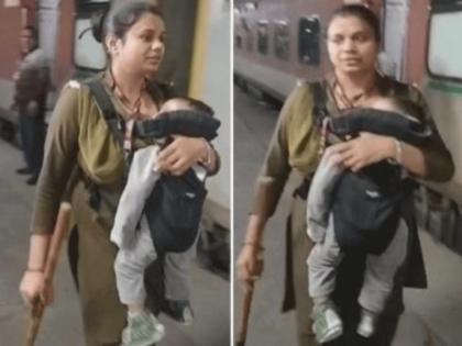 WATCH RPF Constable Seen Performing Duty Carrying Baby  New Delhi Railway Station Amid Stampede Video Surfaces SEE RPF Women Constable Duty | RPF Women Constable Duty: सलाम मां?, भगदड़ के बीच बच्चे को लेकर ड्यूटी करती दिखीं आरपीएफ कांस्टेबल, सोशल मीडिया पर लोग कर रहे तारीफ, देखें वीडियो